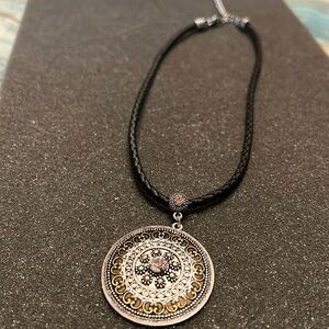 Silver with crystal necklace. Black Leather braid for chain